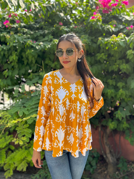 Golden Glow Peplum Top