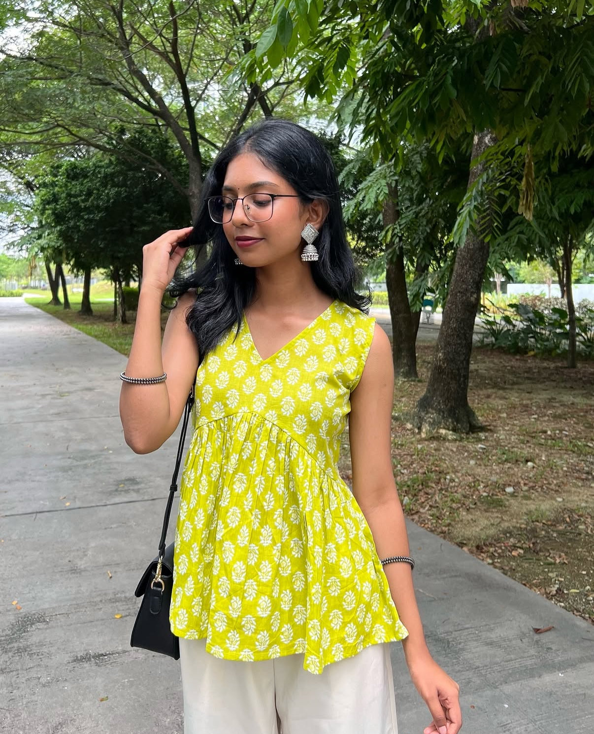 Lime Green Sleeveless Peplum Top