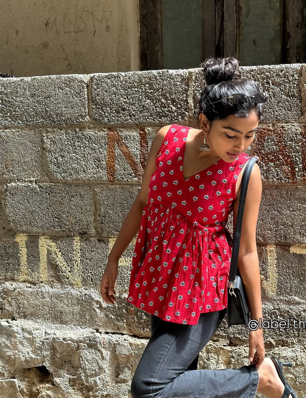 Red Lotus Sleeveless Peplum Top