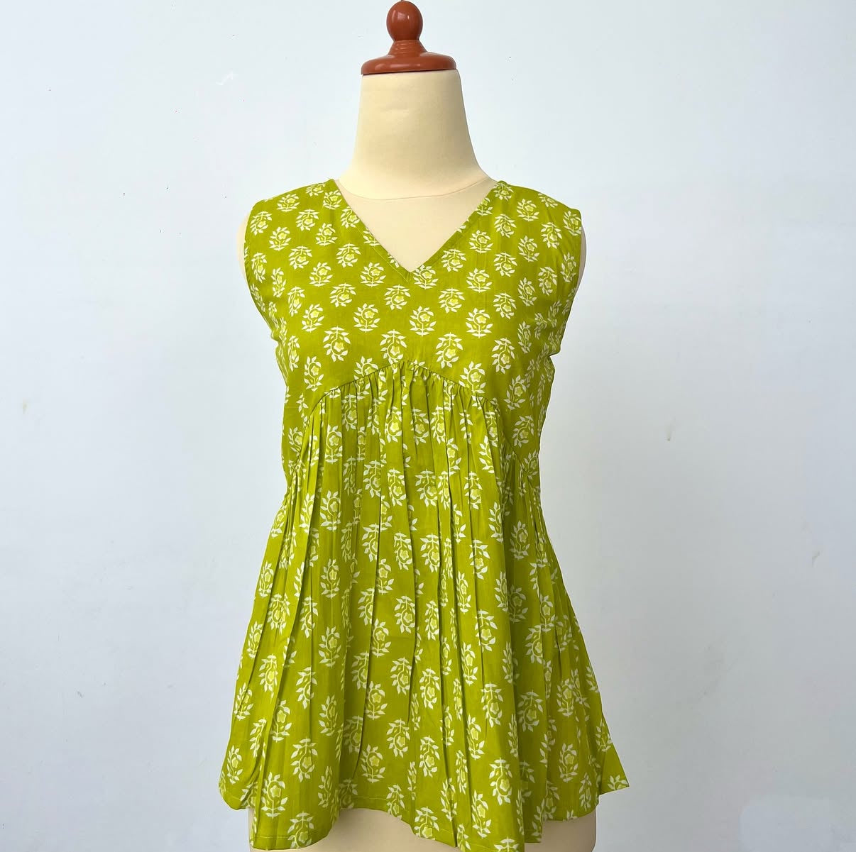 Lime Green Sleeveless Peplum Top