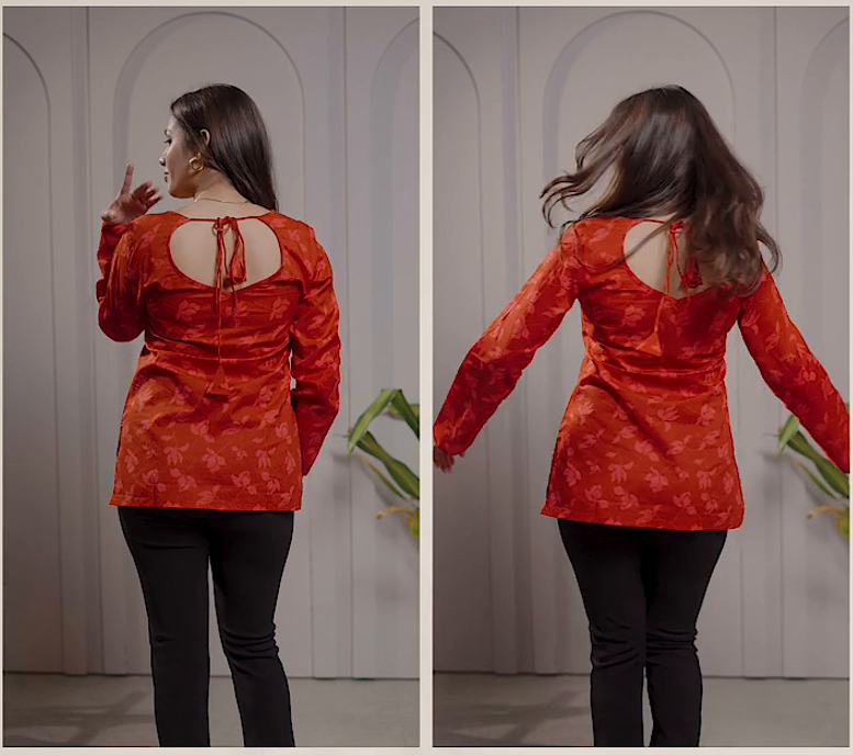 Woman wearing an orange patterned top and black pants, shown from front and back views.
