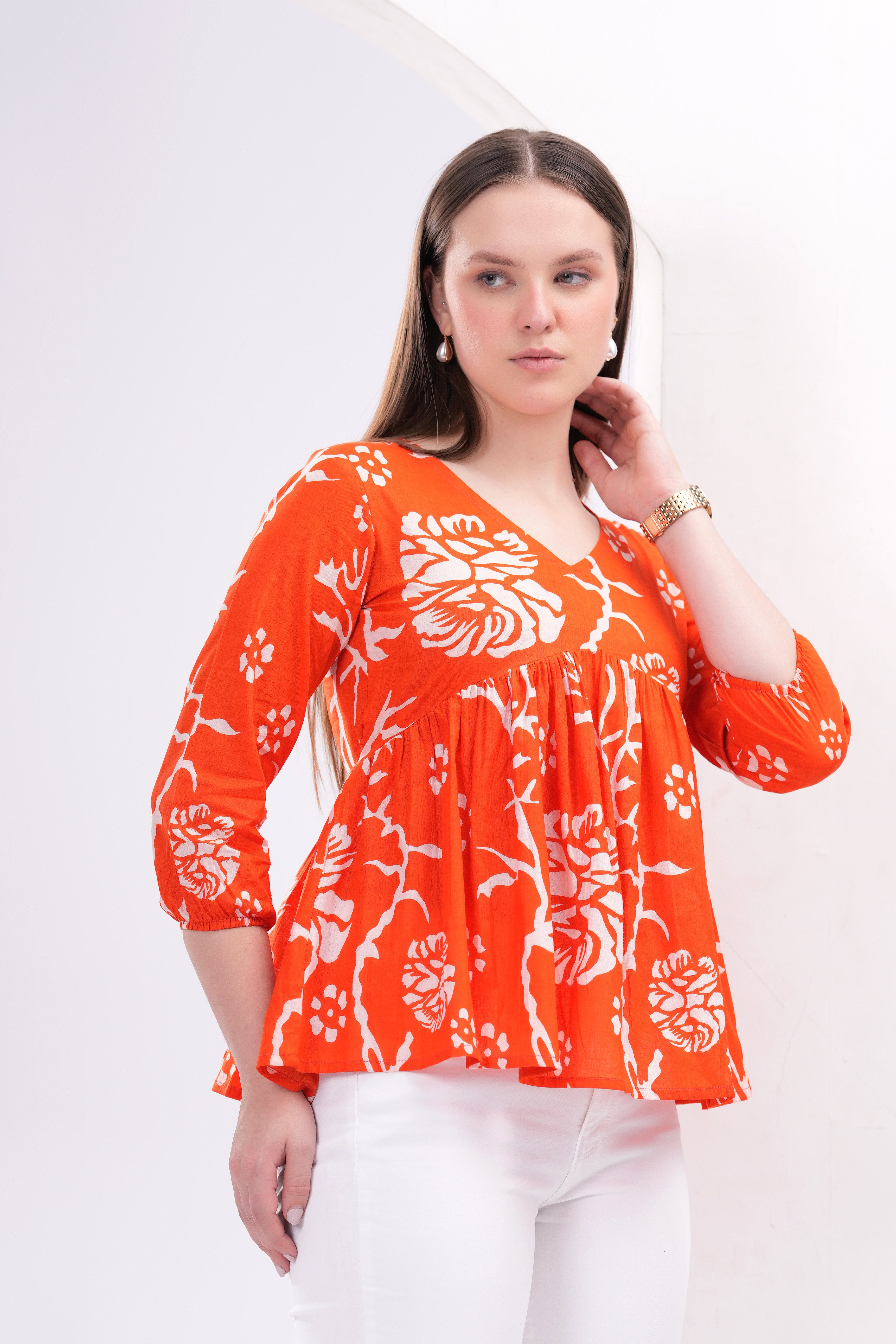 Orange peplum top
