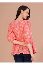 Peach Alia Cut Peplum Top